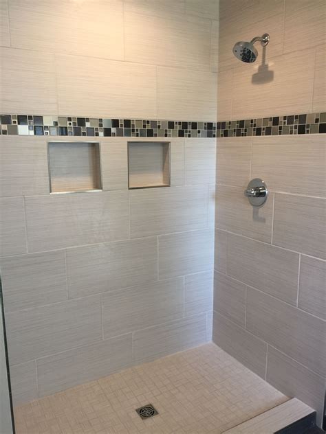 A large tile, such as 12x24, usually requires a 316 grout line, so its best to check the manufacturers recommendations to see how small you can go. . 12x24 bathroom tile layout